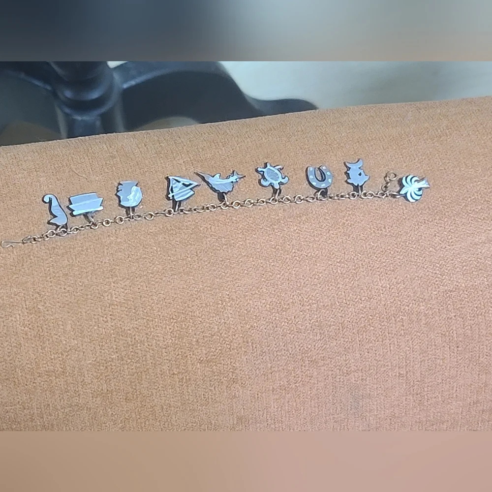 Silver Tone Charm Bracelet with Tropical Motifs, 7 Inches